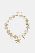 Necklace with shells, sea charms and gold beads
